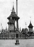 Elaborate pavilions and Buddhist temples are traditionally constructed especially for royal funerals in Siam. The body of the deceased was embalmed and preserved while the cremation site was built. Funereal rites and a period of mourning could take months or even a year before the funeral took place. The embalmed body was then placed in a kneeling position in a gold urn on a high bier inside an ornate edifice to be cremated. Festivities including Chinese theatre and musical shows would be held alongside chanting by Buddhist monks to celebrate the reincarnation of the soul as per Buddhist belief. In Siam, people of all ranks were cremated rather than buried, with the exception of criminals, babies and women who had died in childbirth.