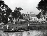 At the turn of the 20th century, the vast majority of Siamese were rice farmers who lived and worked along waterways. Every household had a boat, an estimated 600,000 of which navigated the canals and rivers of Bangkok. Rowing was done from the back of the boat. Most houses were made from wood and bamboo, and were built on stilts with a ladder running to the water.