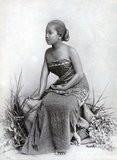 Javanese woman posing in a sarong, photo by Cephas, late 19th century.