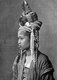 Burma / China: A Hani Akha woman in traditional dress, c. 1900