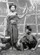 Thailand: Village girls fetch water near Chiang Mai, northern Thailand, c. 1900.