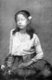 Thailand: An ethnic Mon girl poses for a photograph in Bangkok, late-19th century.